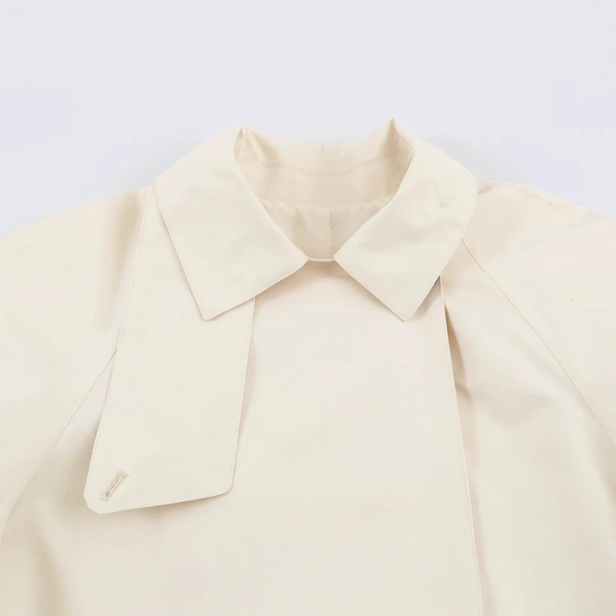Slanted double button lapel trench coat for women