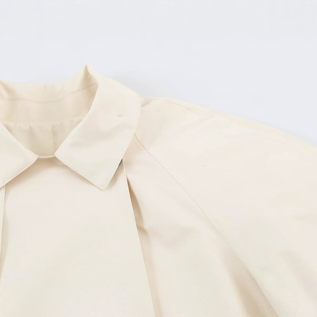 Slanted double button lapel trench coat for women