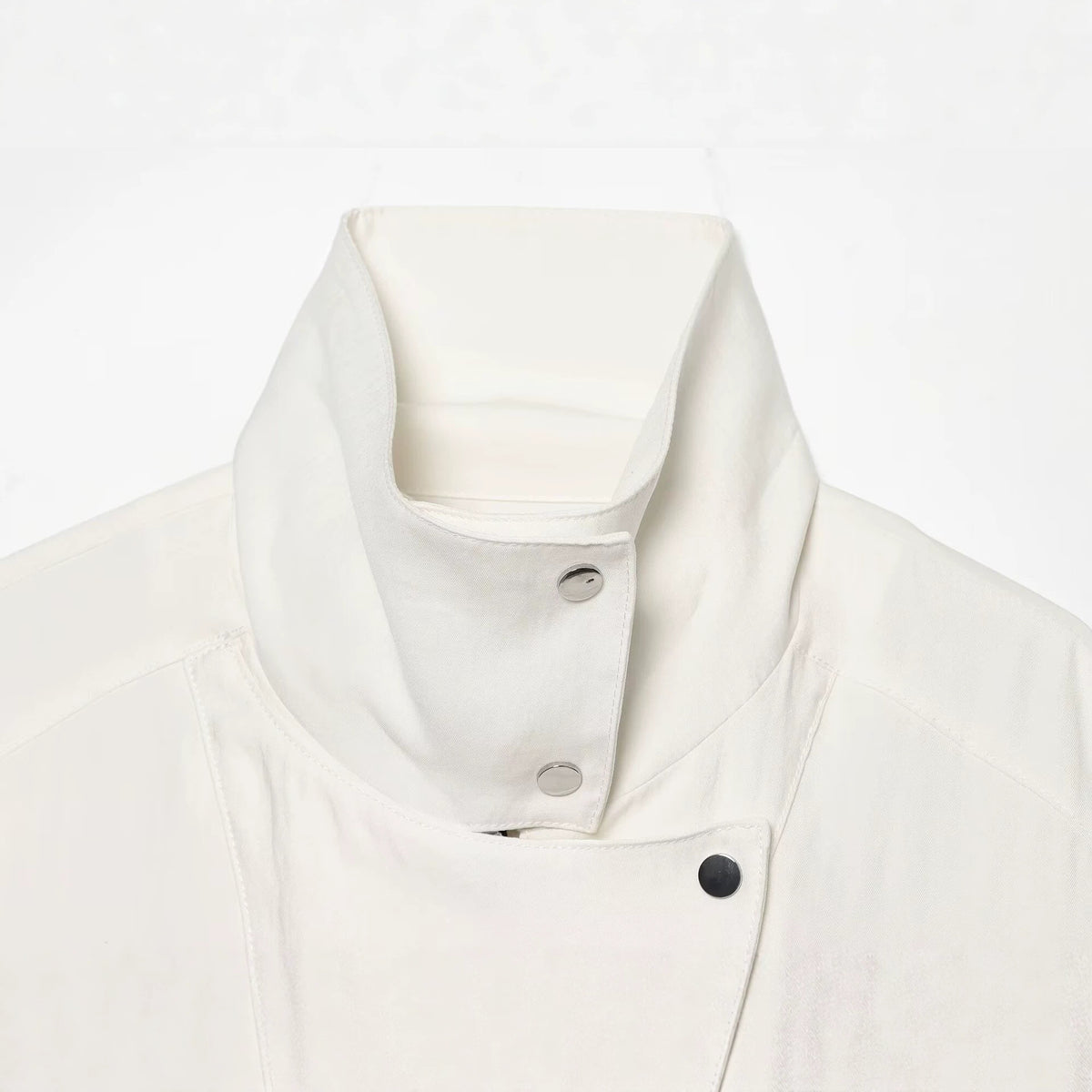 Casual loose pocket trimmed buckle stand up collar jacket